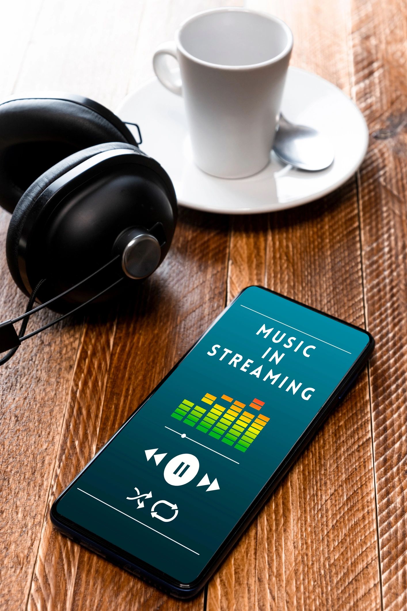 Smartphone with headphones, representing the Radio Donya streaming app